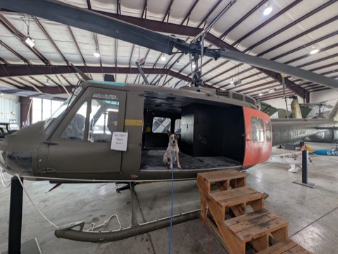 Cleared for takeoff in a Huey. The sign said don't open the doors; it said nothing about dogs.